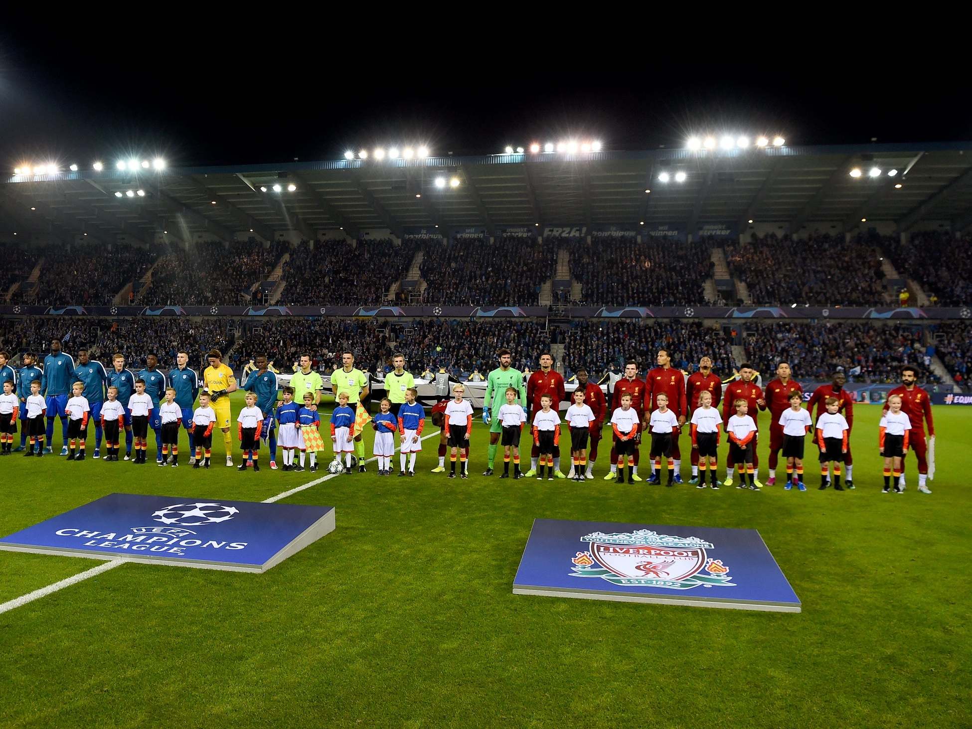 Liverpool and Genk line up before kick-off in Belgium