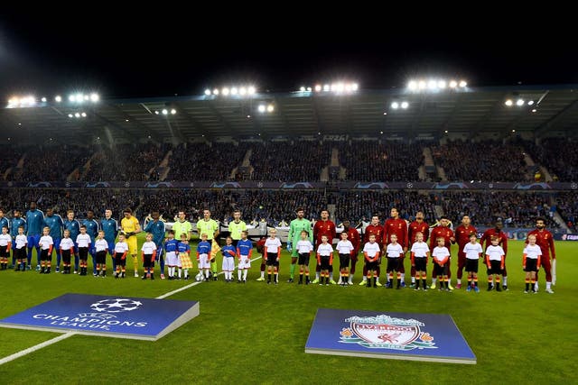 Liverpool and Genk line up before kick-off in Belgium