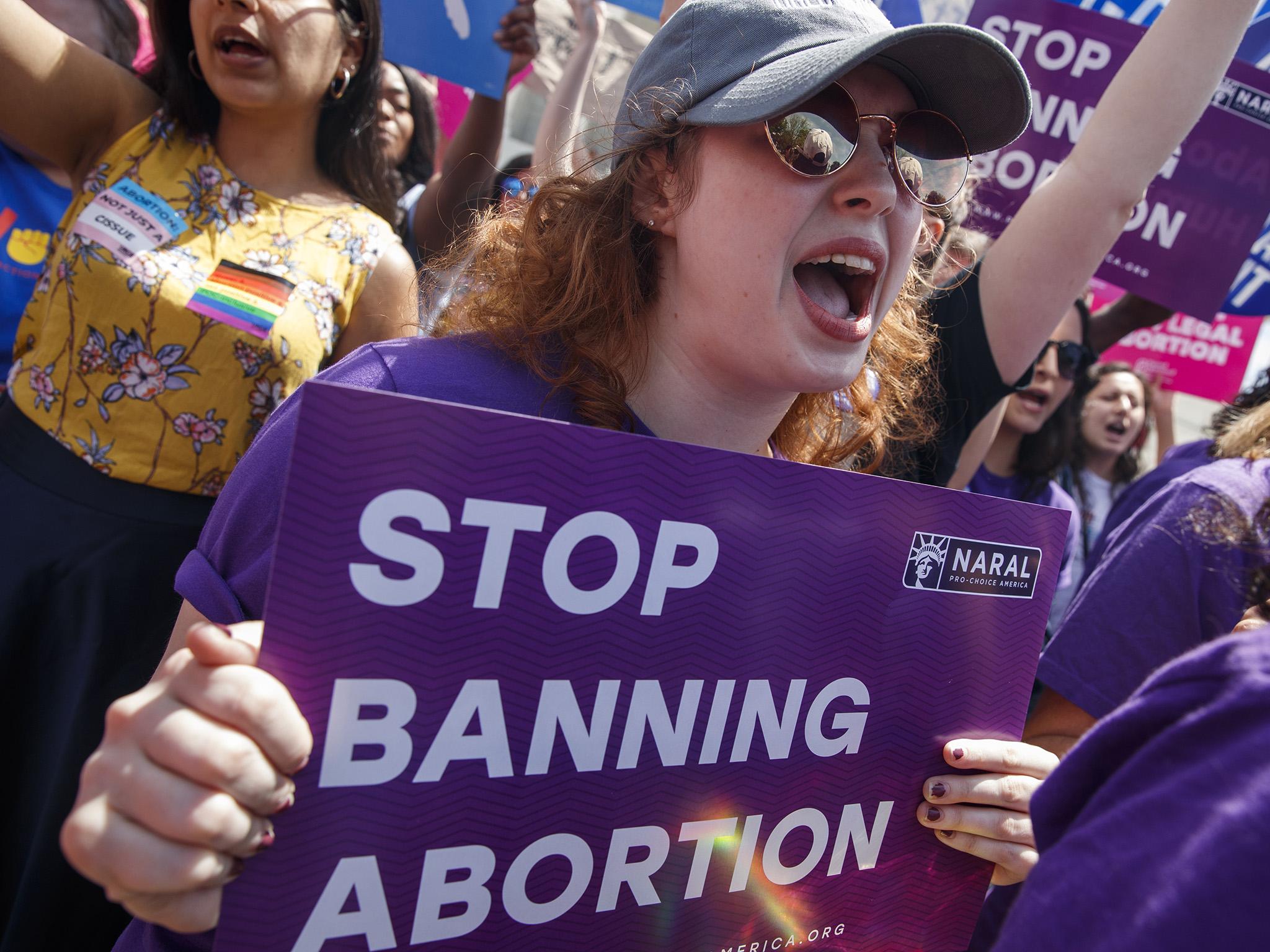 Activists across the US have called for a halt to legislation that restricts abortion rights