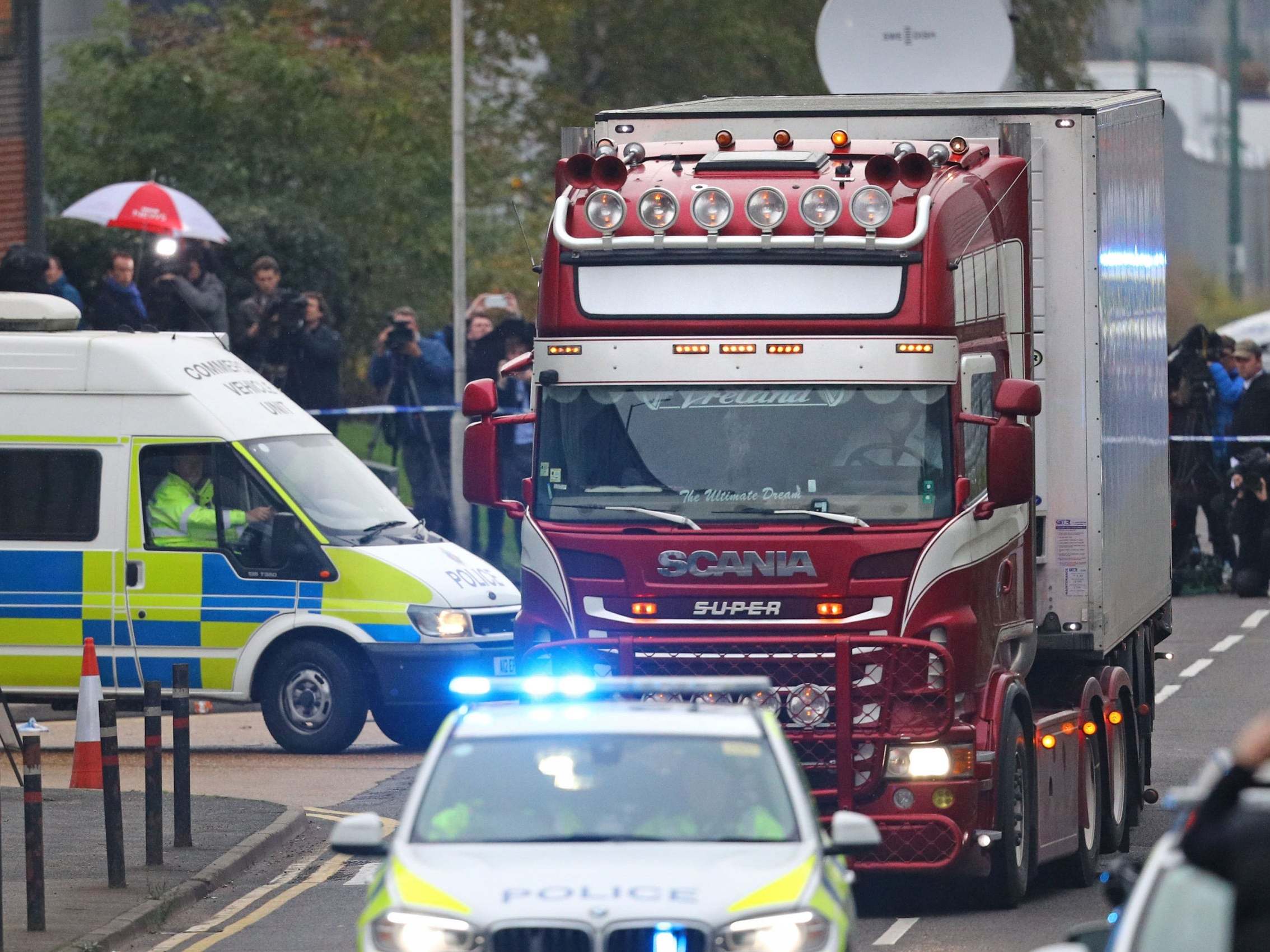 The container lorry where 39 people were found dead inside leaves Waterglade Industrial Park in Grays, Essex