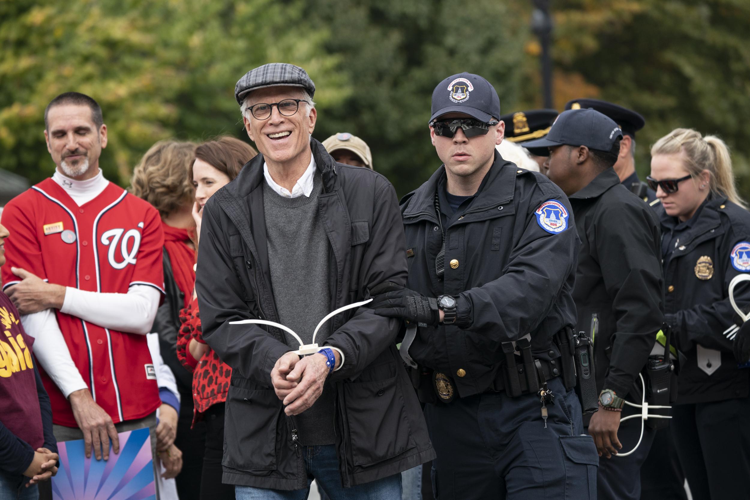 Ted Danson is arrested at the Capitol after he, Jane Fonda, and other demonstrators called on Congress for action to address climate change, in Washington, DC on 25, October 2019.