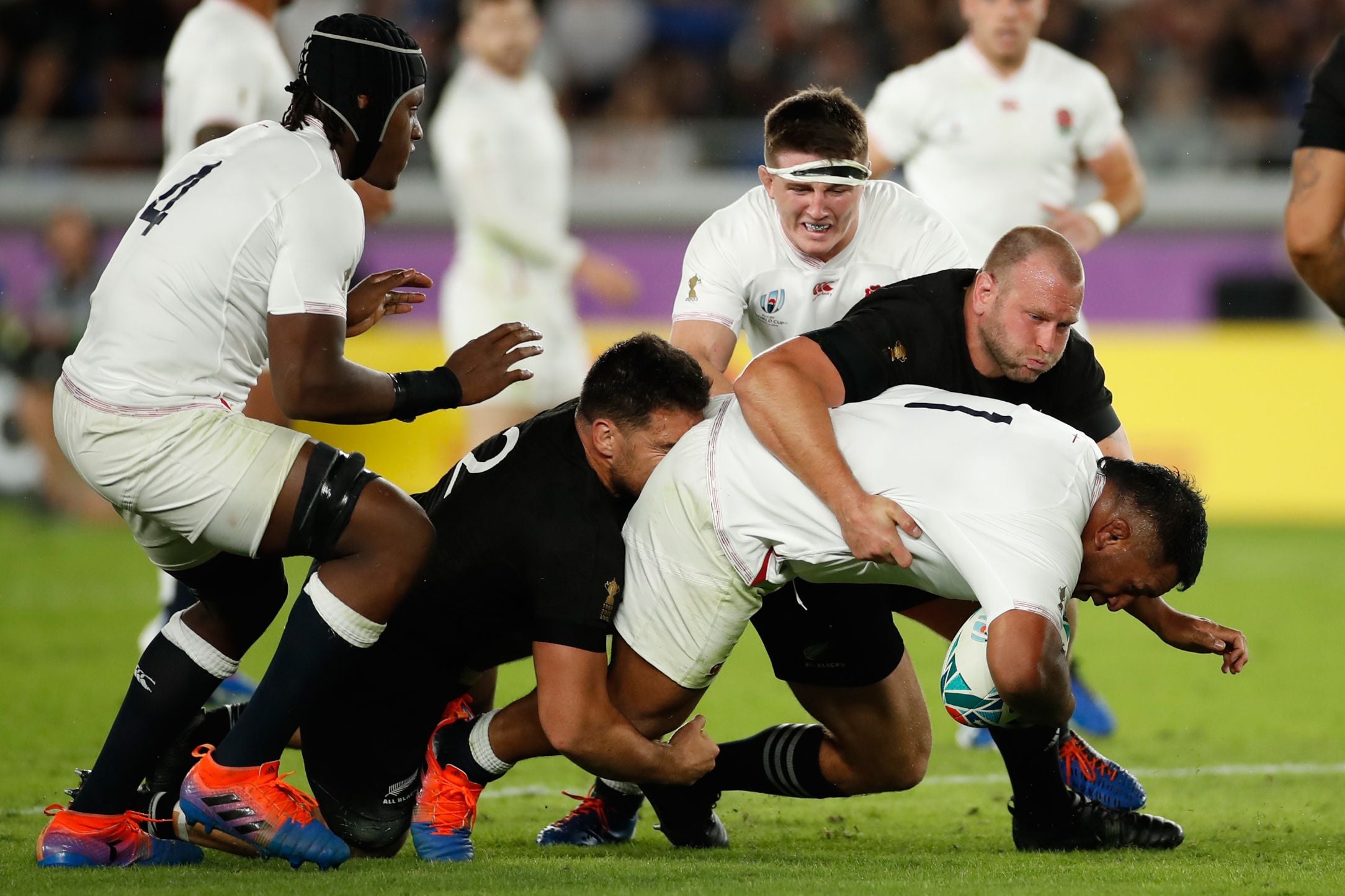 England battled hard to overcome the All Blacks (AFP via Getty)