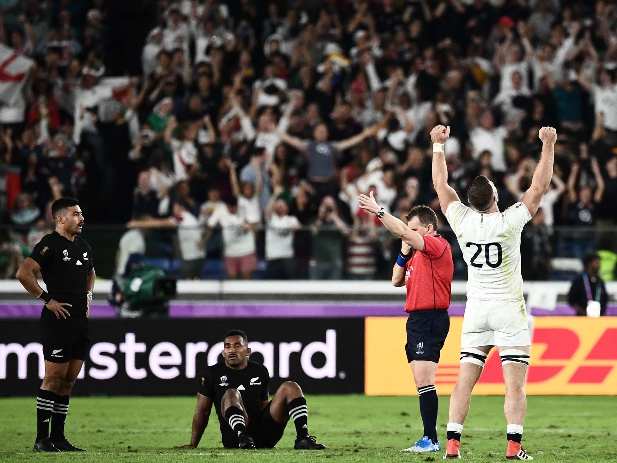 England celebrate their victory at the final whistle