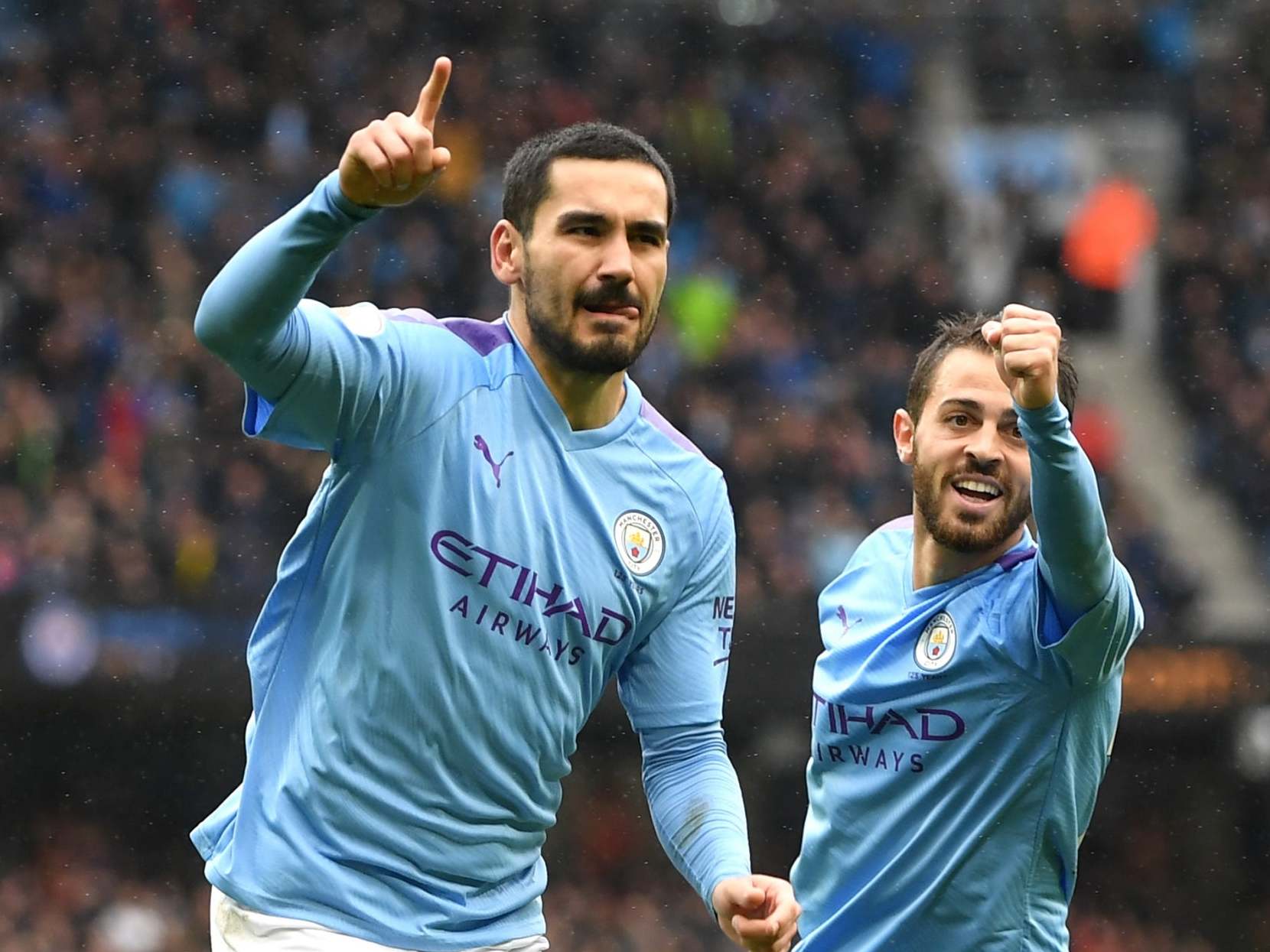 Ilkay Gundogan celebrates after scoring against Aston Villa