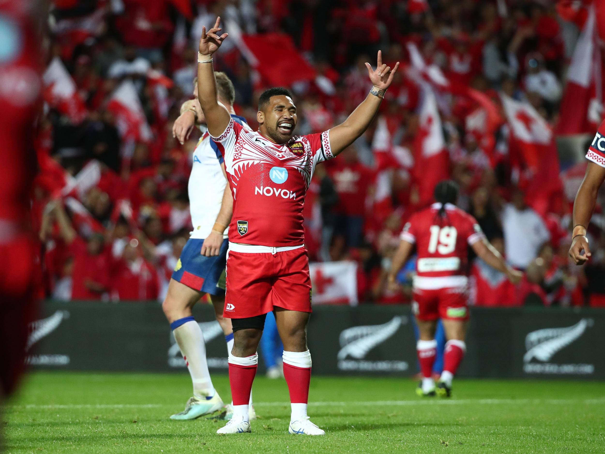 Siliva Havili of Tonga celebrates his side's victory over Great Britain