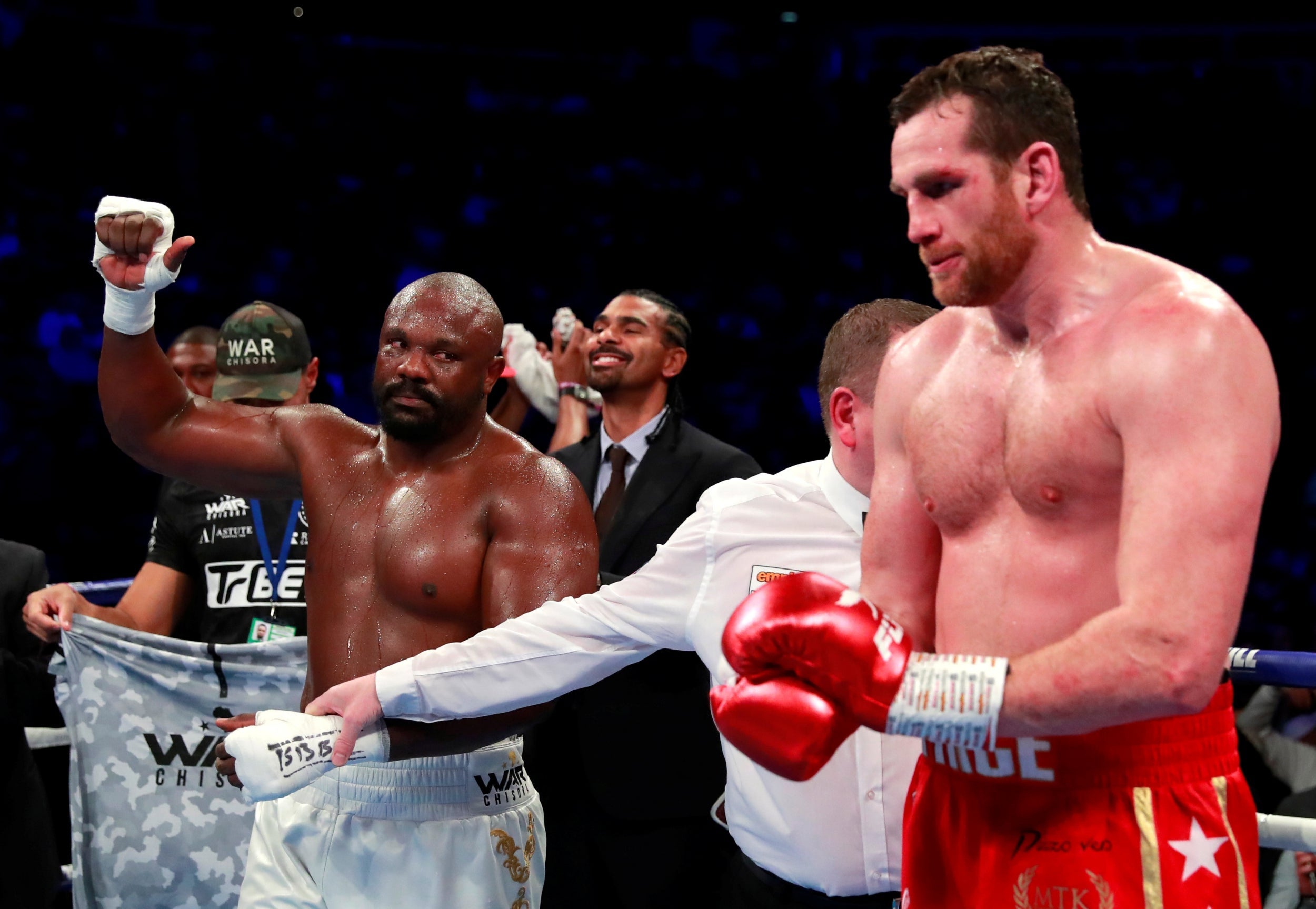 Price and Chisora in the ring following their fight 