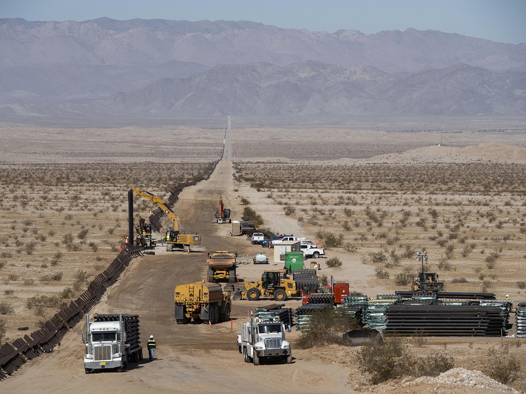 The president pledged to erect nearly 500 miles of the border wall by the end of next year