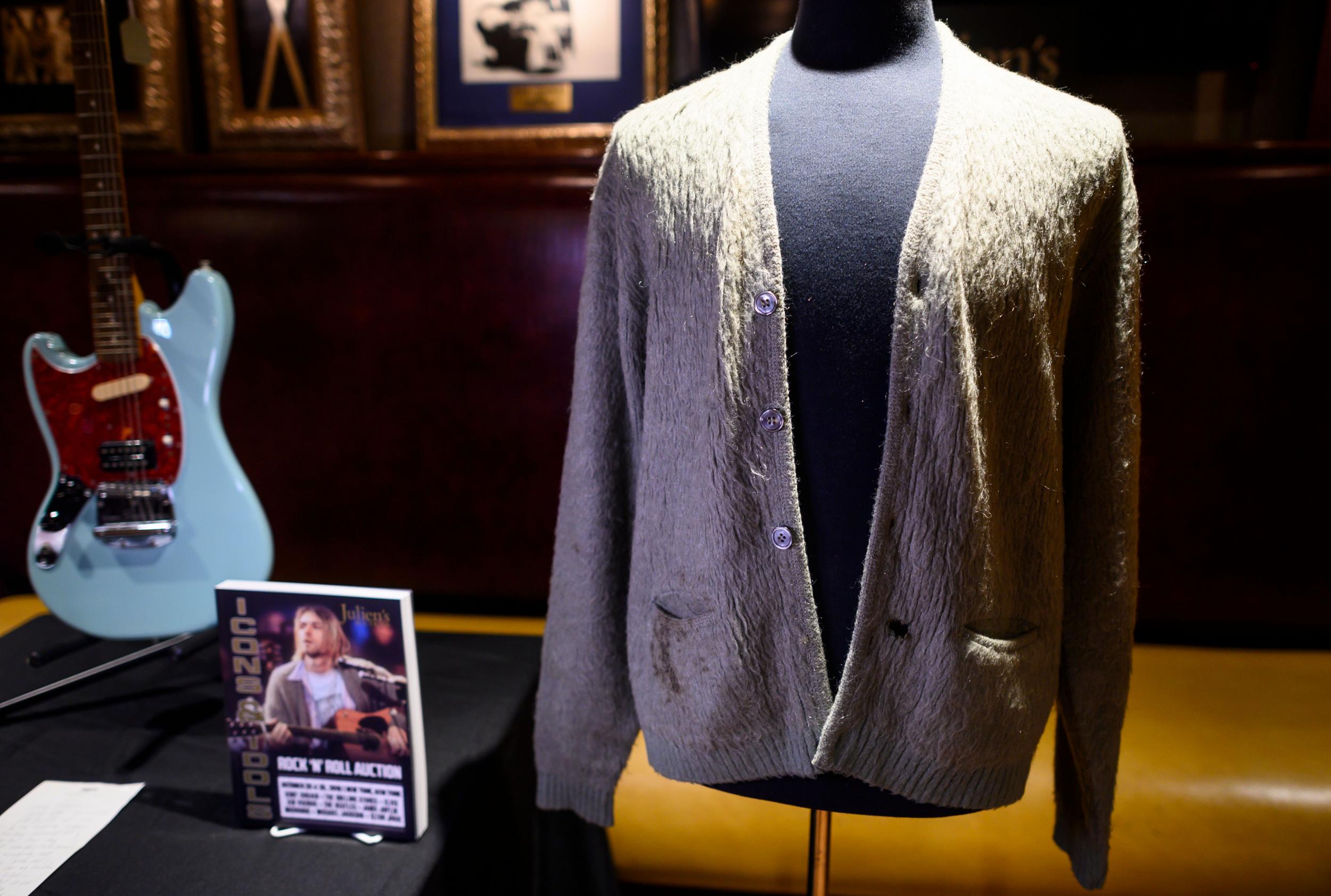 Kurt Cobain’s cardigan from Nirvana’s 1993 MTV Unplugged performance on display at the Hard Rock Cafe in New York City (Getty Images)