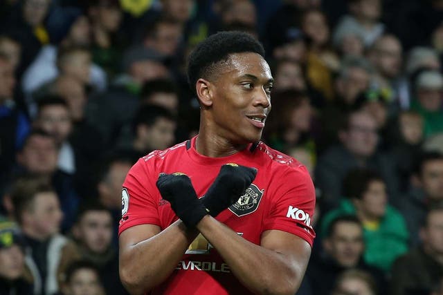 Anthony Martial celebrates at Norwich