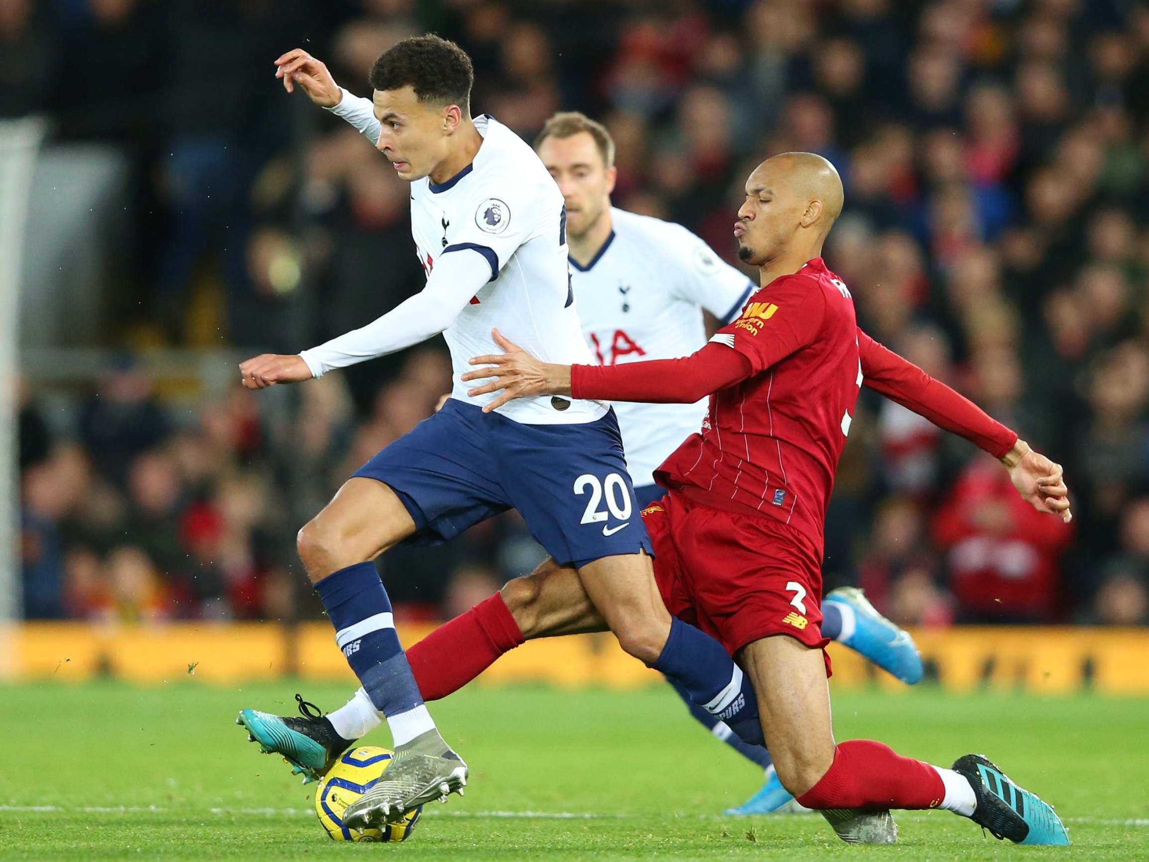 Fabinho takes possession off Dele Alli