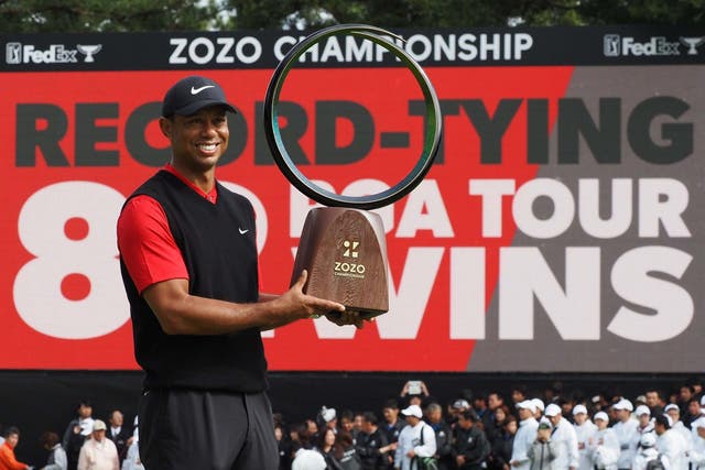 Tiger Woods celebrates his 82nd victory on the PGA Tour