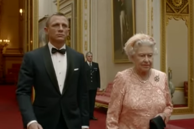 Daniel Craig, as James Bond, escorts The Queen to the 2012 London Olympics Opening Ceremony