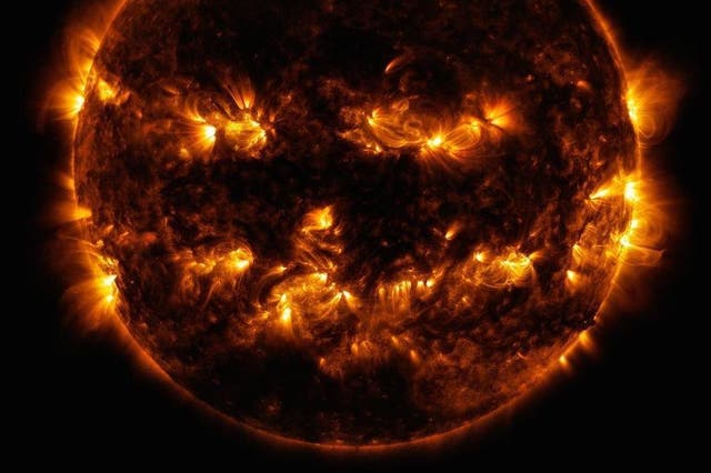 Sun resembles a jack-o'-lantern (NASA/SDO)