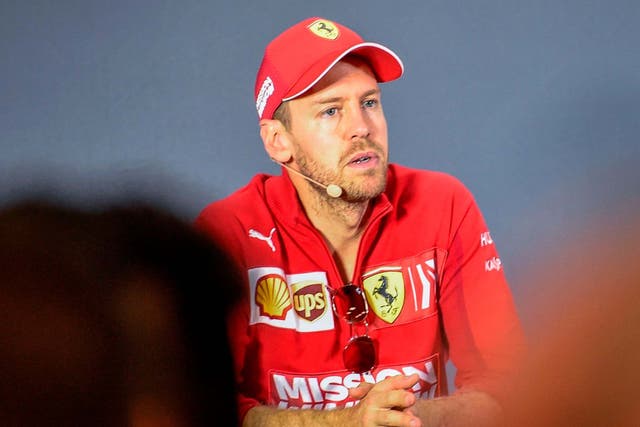 Sebastian Vettel attends a press conference