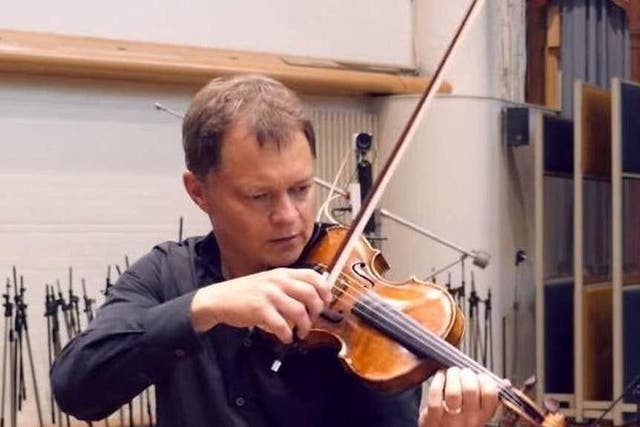 Stephen Morris playing his violin