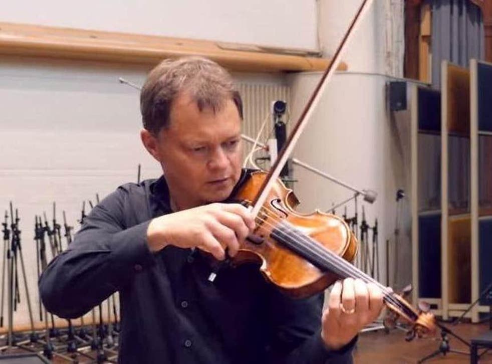 Stephen Morris playing his violin