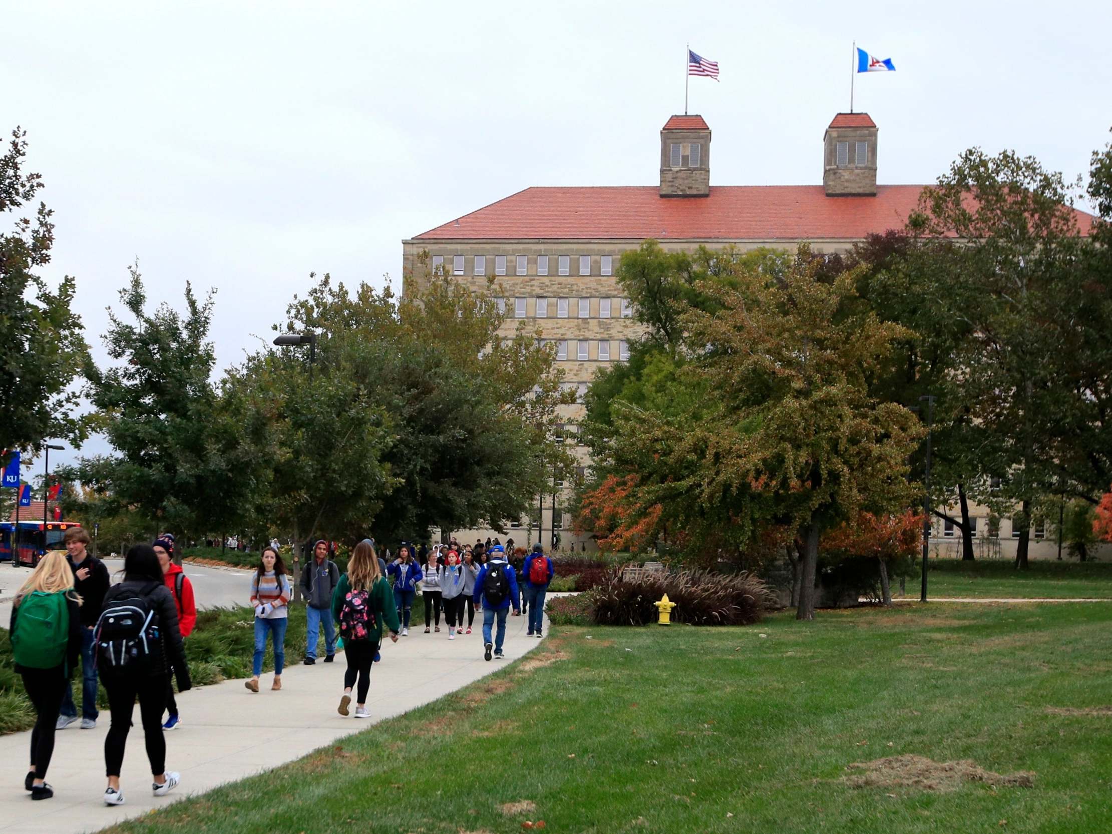 Students walk on the University of Kansas campus