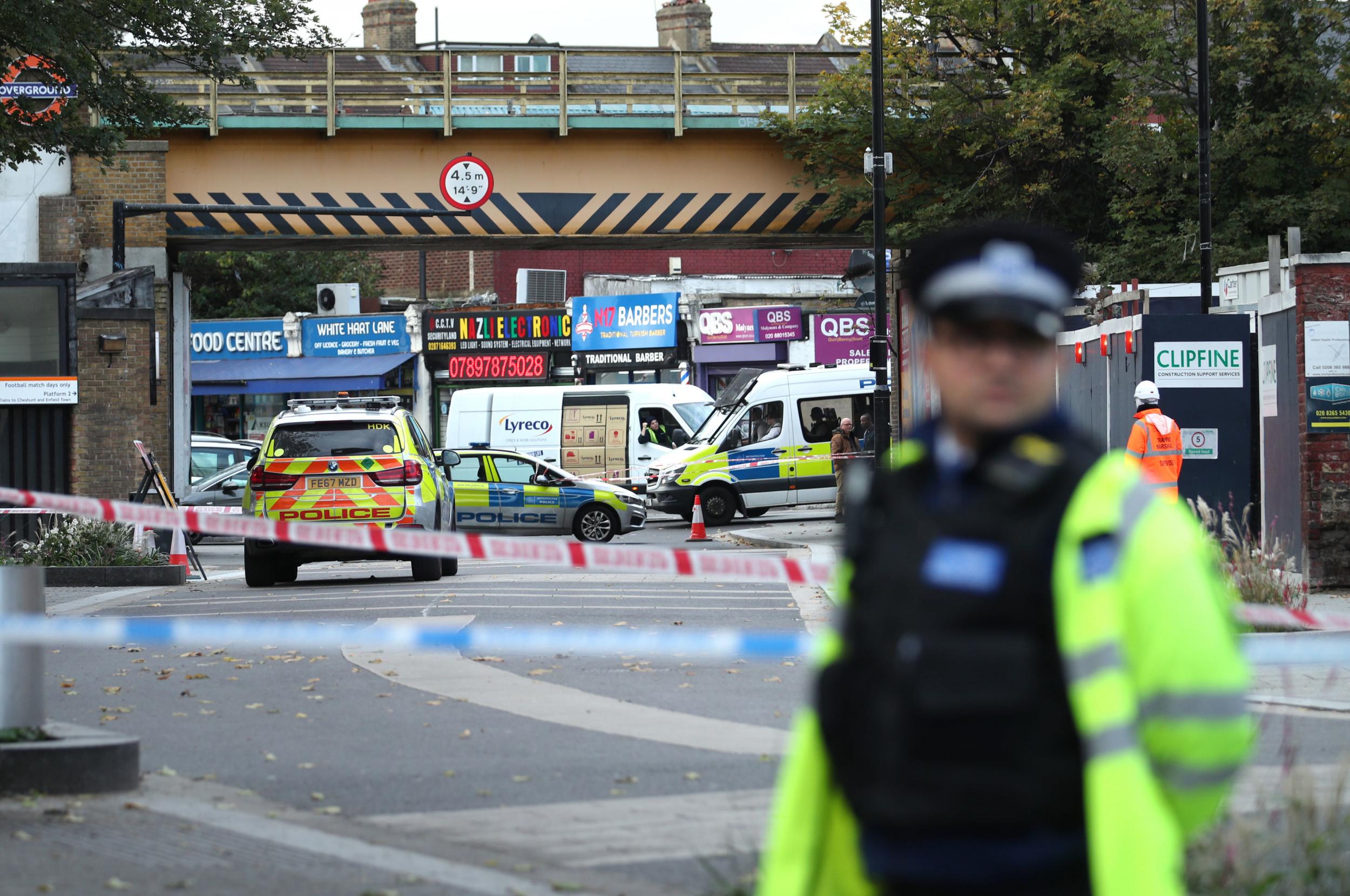 Police closed the road in Tottenham after the incident, which left a firearms officer in hospital