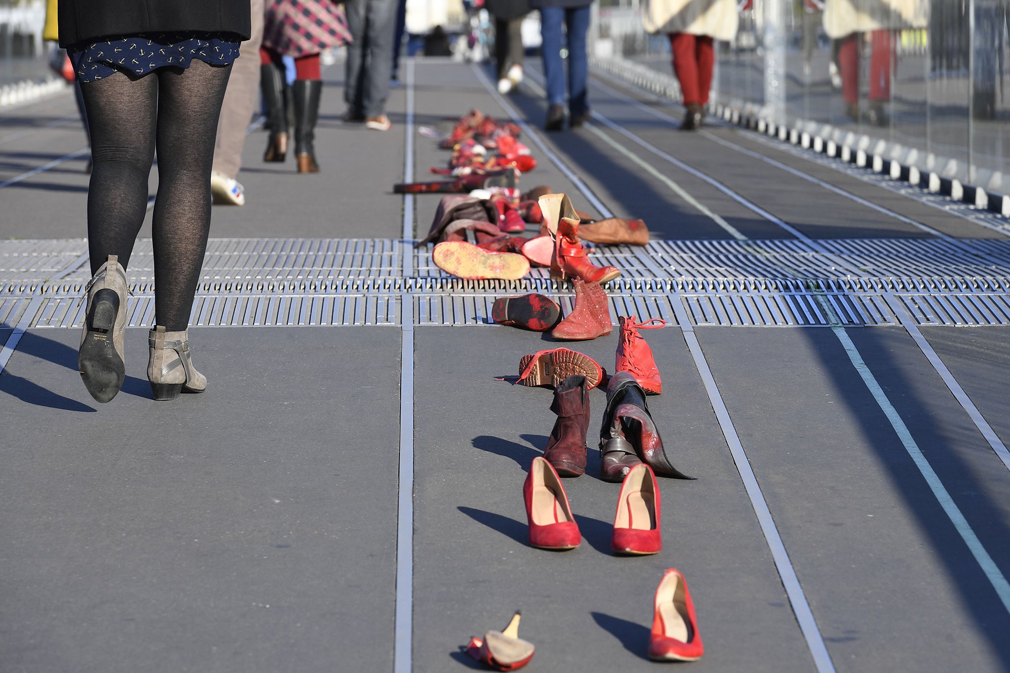 Red-painted shoes are often used to symbolise the female victims of domestic violence, harassment, rape, sexual assault or femicide