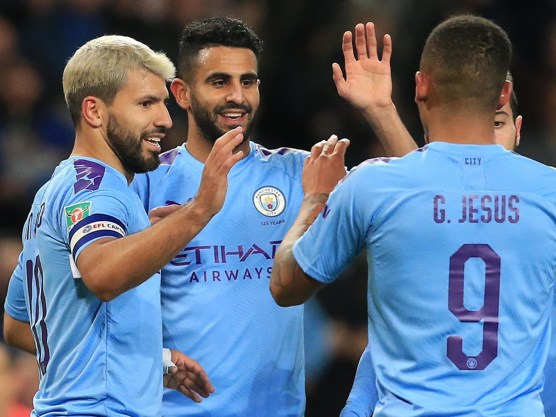 Sergio Aguero celebrates scoring Manchester City's third