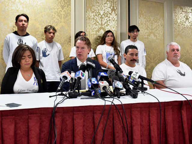 The aunt and uncle of Diego Stolz appear at a press conference with family members and attorney David Ring