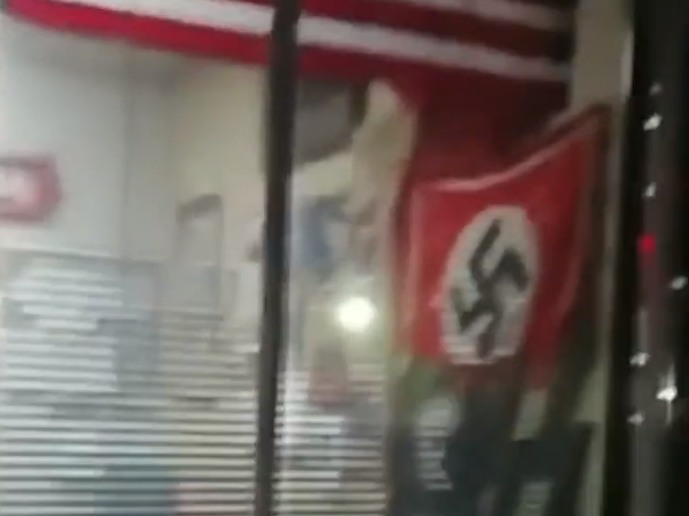A swastika flag was seen through a window of a California state building