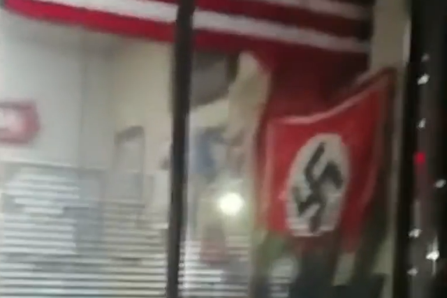 A swastika flag was seen through a window of a California state building