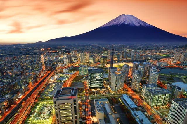 Mount Fuji looms in the background of Yokohama