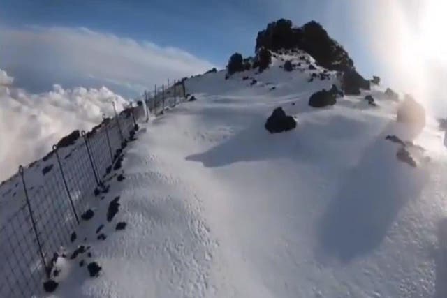Video footage appears to show the man approaching the summit of Mount Fuji before falling