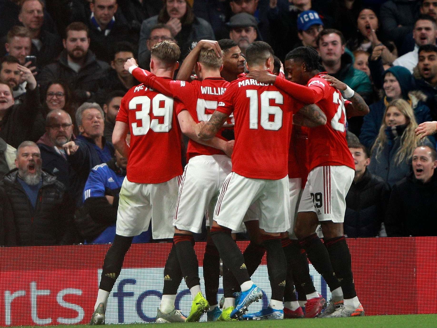 United celebrate at Stamford Bridge