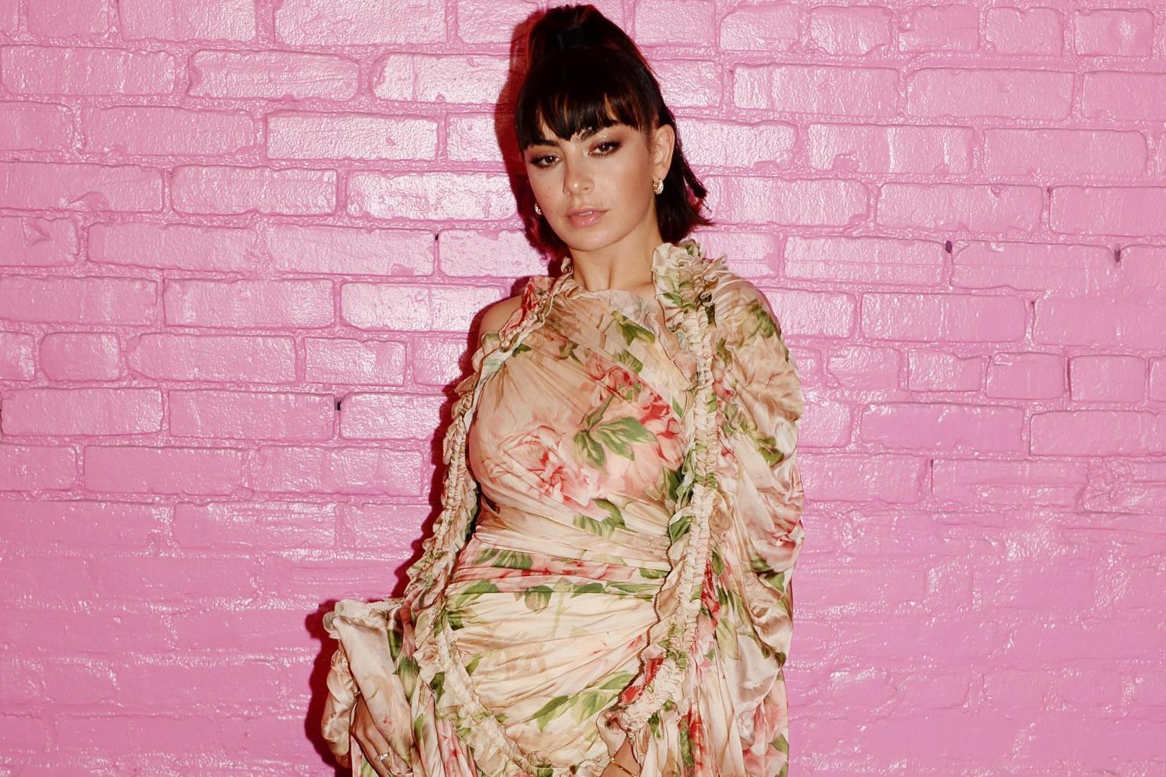 Charli XCX defends fans who asked her to sign dead mum's ashes and a douche