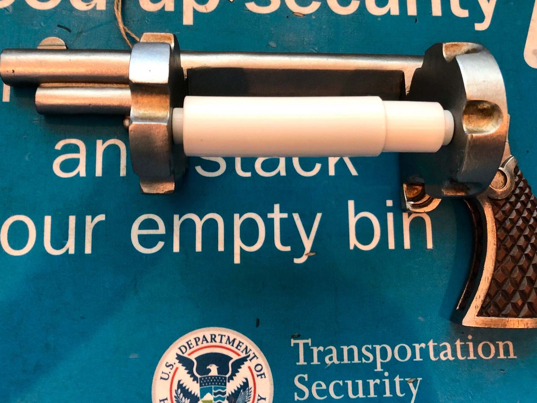 The toilet paper dispenser was confiscated at a security checkpoint at Newark Liberty International Airport