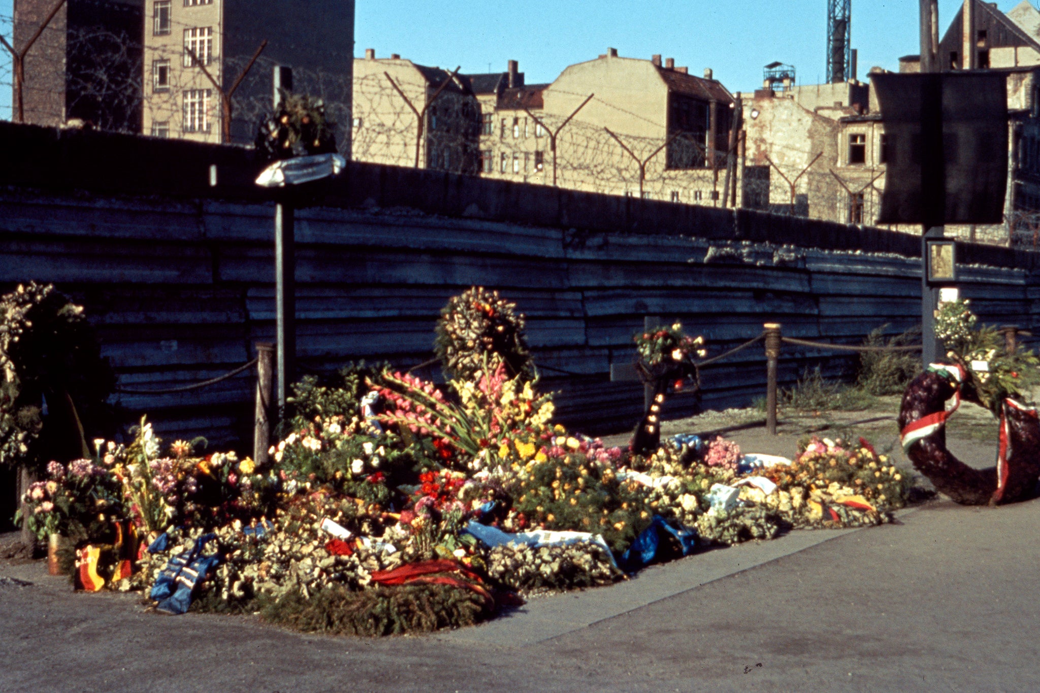 A flower memorial for Fechter on the western side of the wall at the point where he was shot on the eastern side