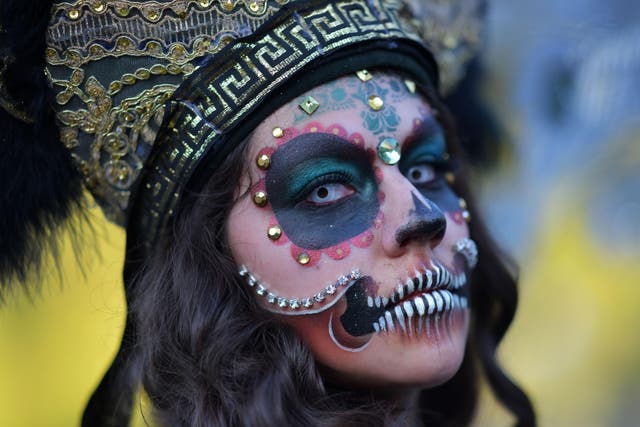 A participant in last year’s Day of the Dead parade in Mexico City
