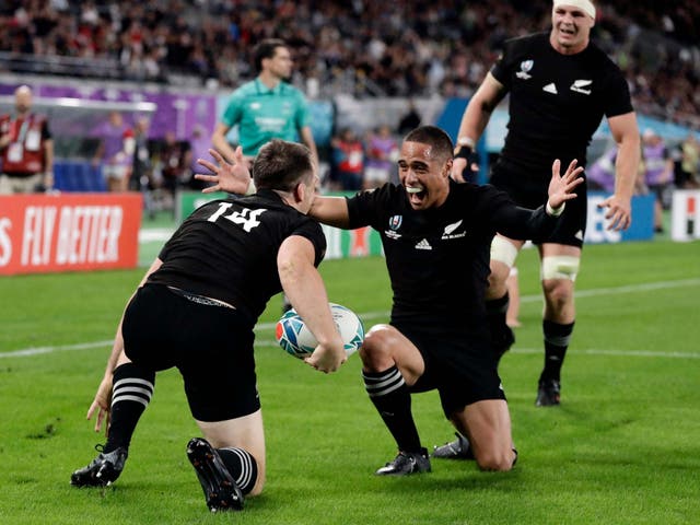 New Zealand's Ben Smith is congratulated by teammates