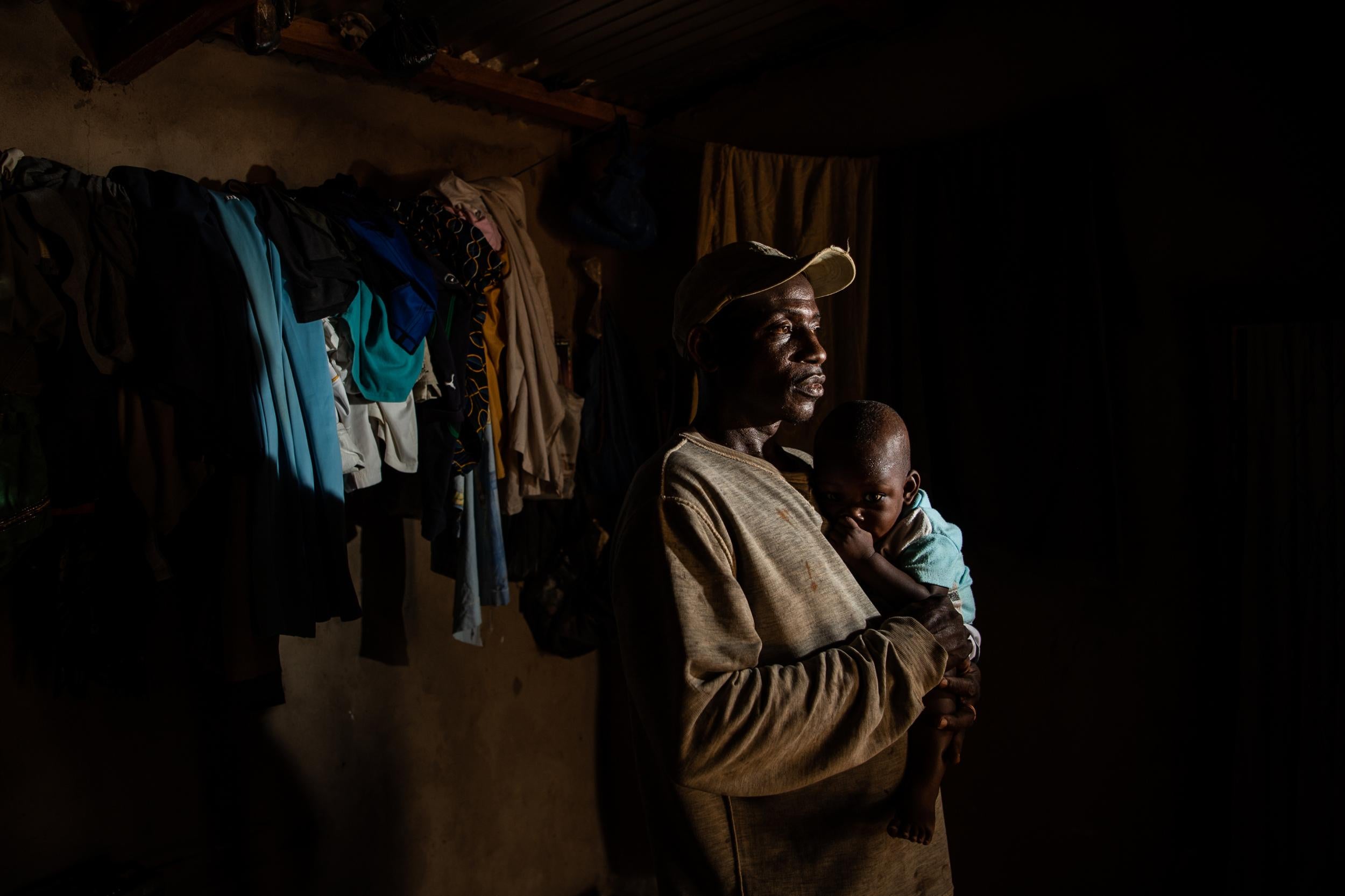 Cocoa farmer Coulibaly Abou struggles to earn enough for his family. He lives with his wife and six children, including his 1-year-old son, Sidiki, in the village of Gloplou in Ivory Coast