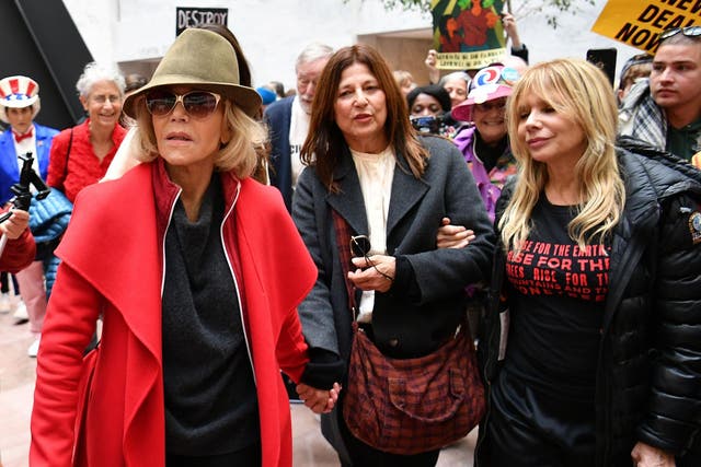 Jane Fonda, Catherine Keener and Rosanna Arquette walk inside the Hart Senate office building during a climate change protest on 1 November, 2019 in Washington, DC.