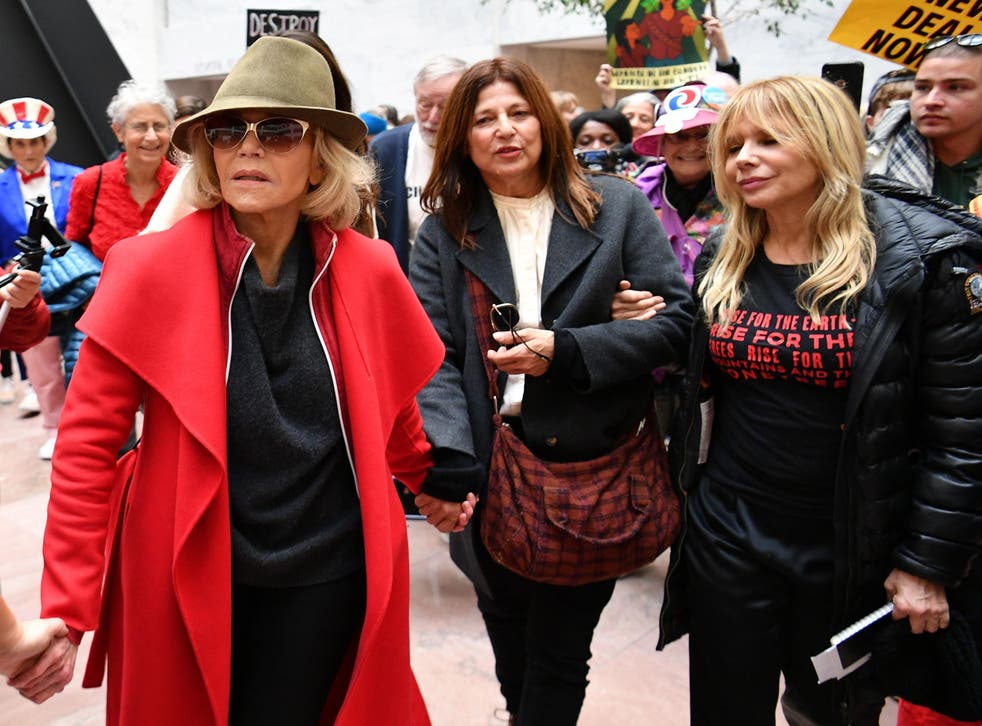 Jane Fonda, Catherine Keener and Rosanna Arquette walk inside the Hart Senate office building during a climate change protest on 1 November, 2019 in Washington, DC.