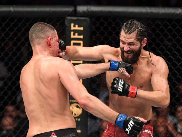 <p>Nate Diaz (left) and Jorge Masvidal during their UFC bout in 2019 </p>