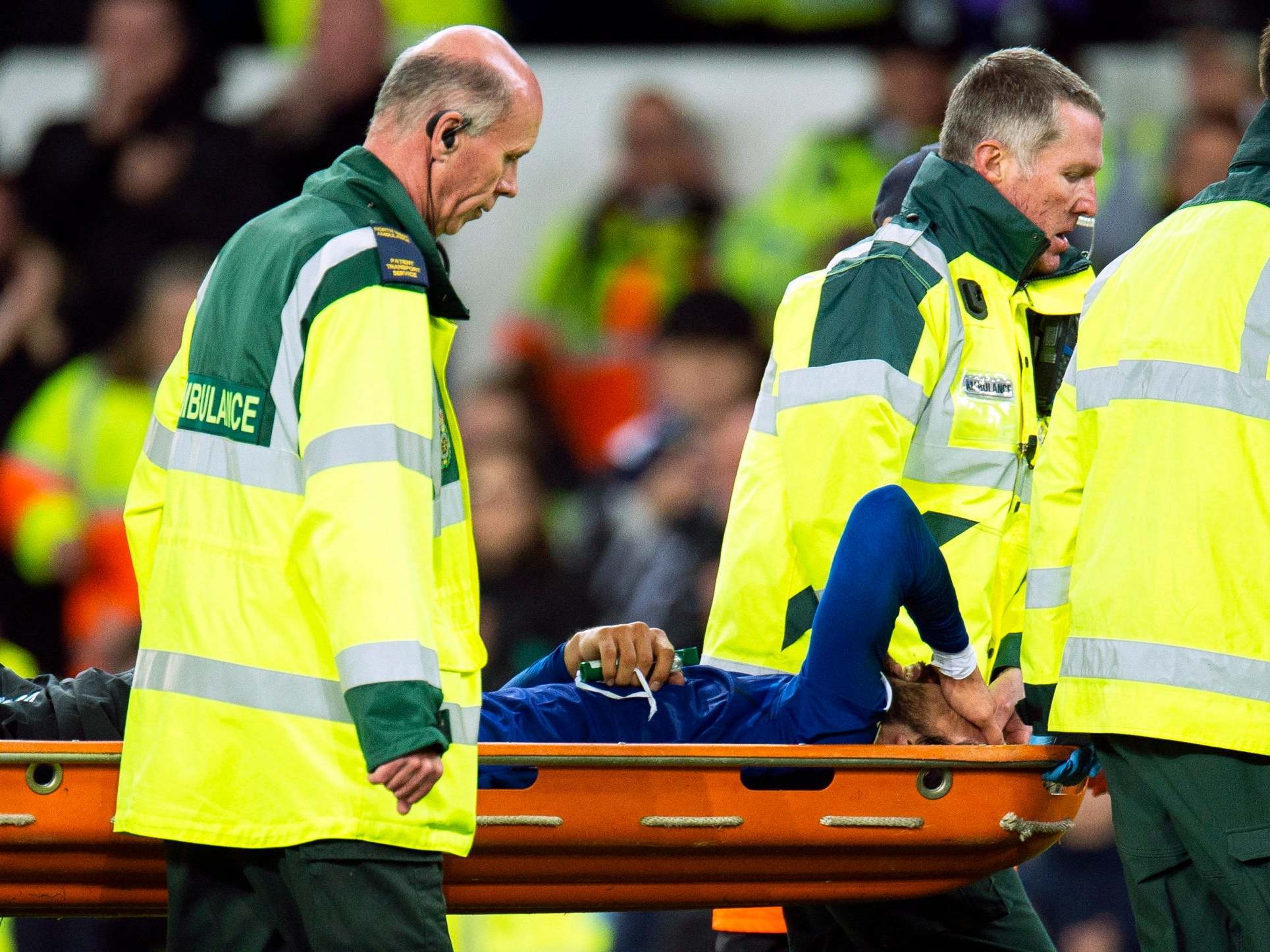 Andre Gomes is taken off on a stretcher by medics