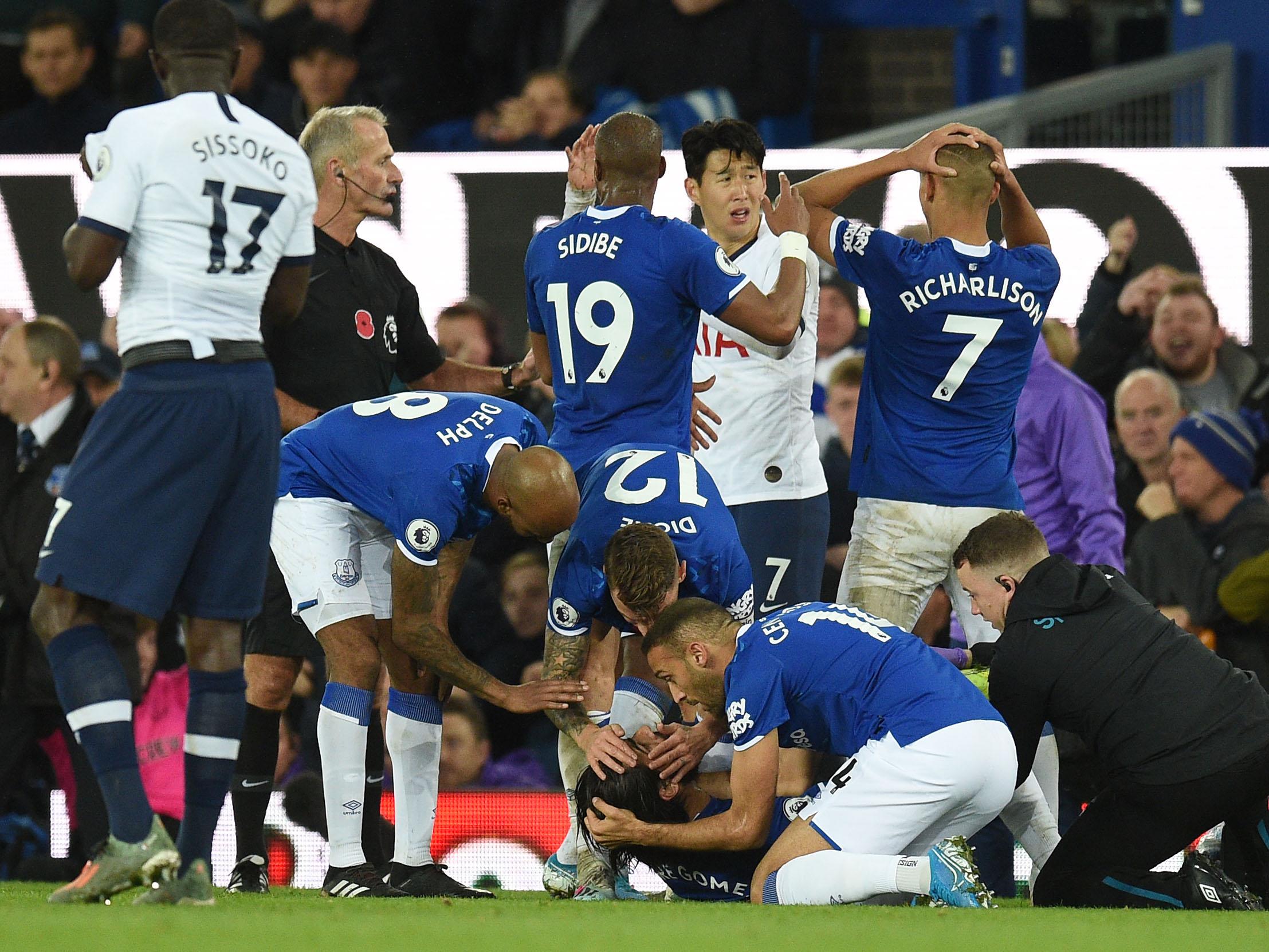 Cenk Tosun tried to comfort injured teammate Andre Gomes