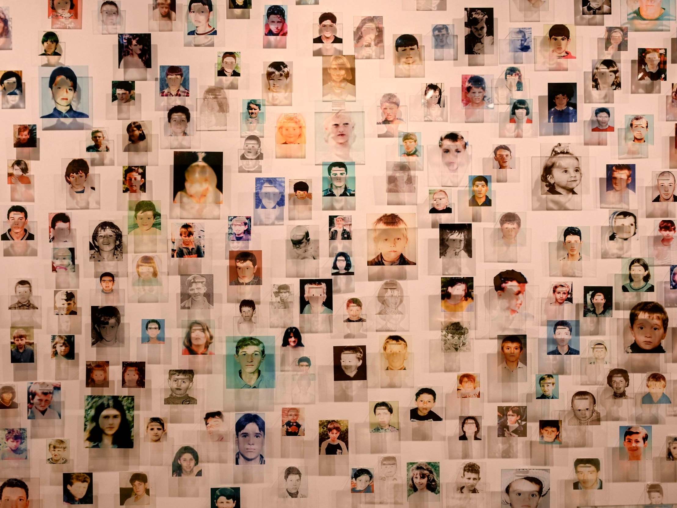 Portraits, at the ‘Once upon a time and never again’ exhibition, of some of the 1,133 children killed during the war