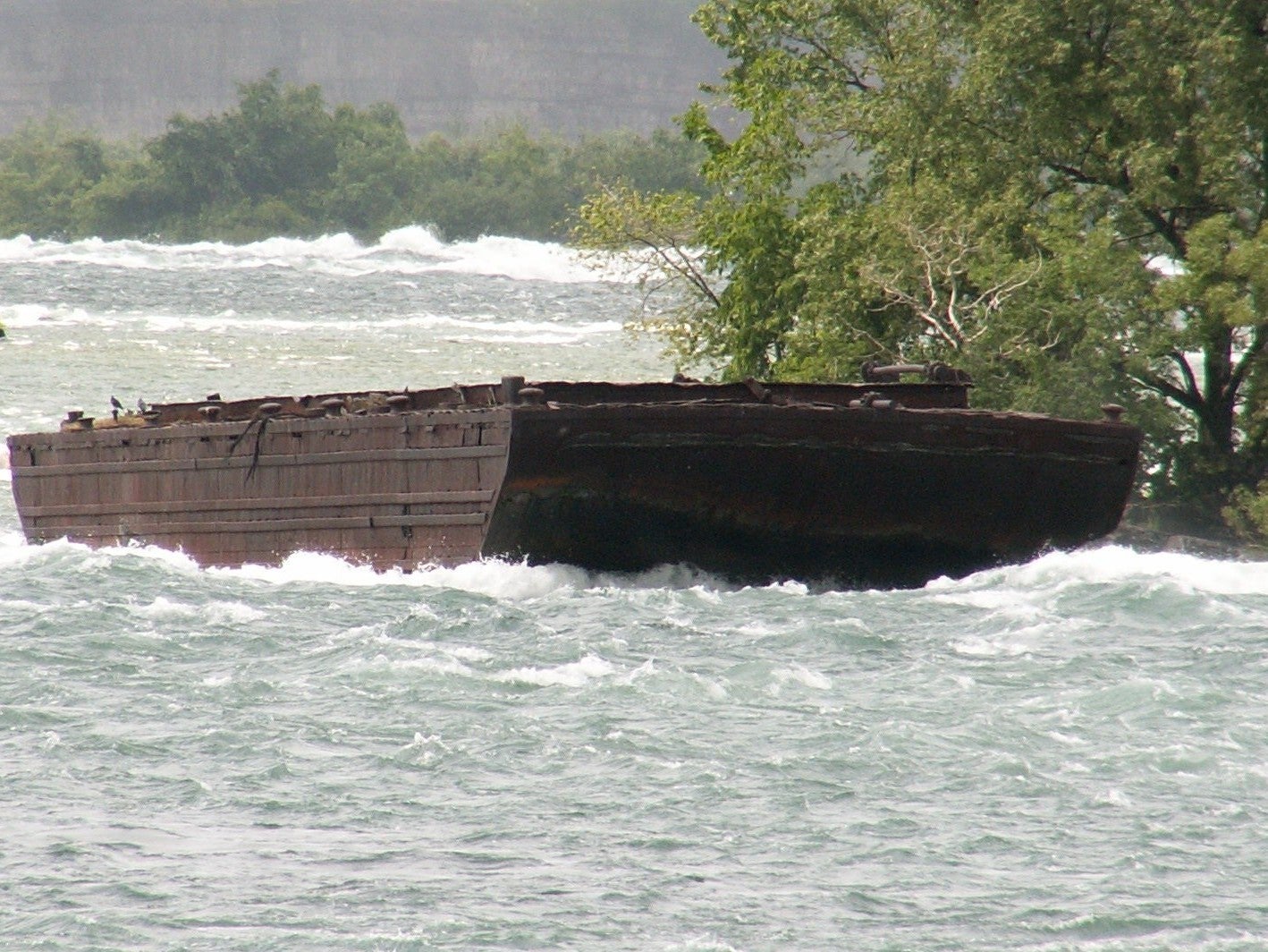 Boat stuck above Niagara Falls for more than a century dislodged by severe storms