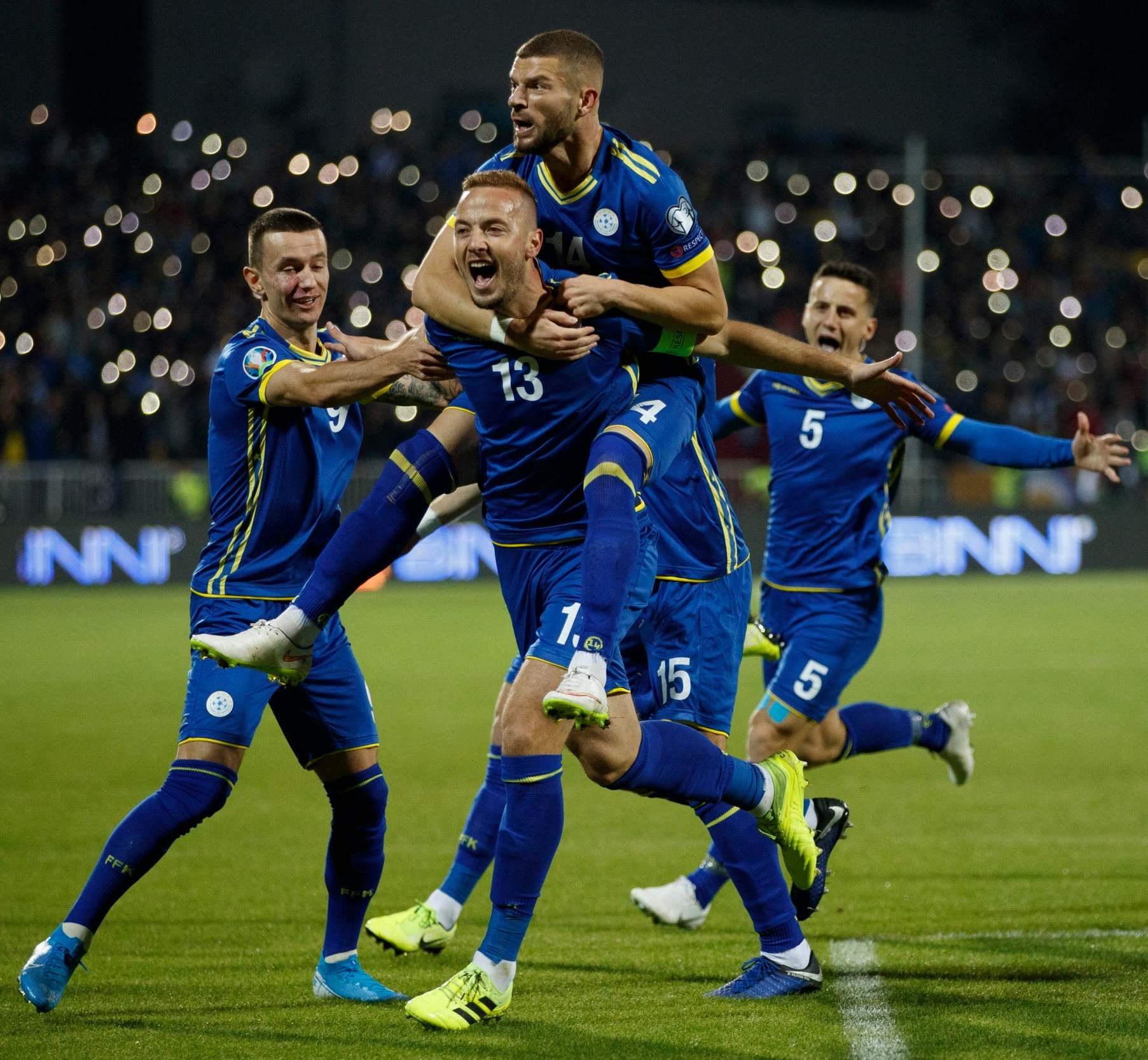 The Kosovo team celebrate after scoring the opening goal in a qualifying Euro 2020 match against Montenegro