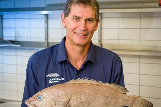 Bringing a whole new meaning to cooked rare. Queensland Museum's Jeff Johnson with the new species of fish