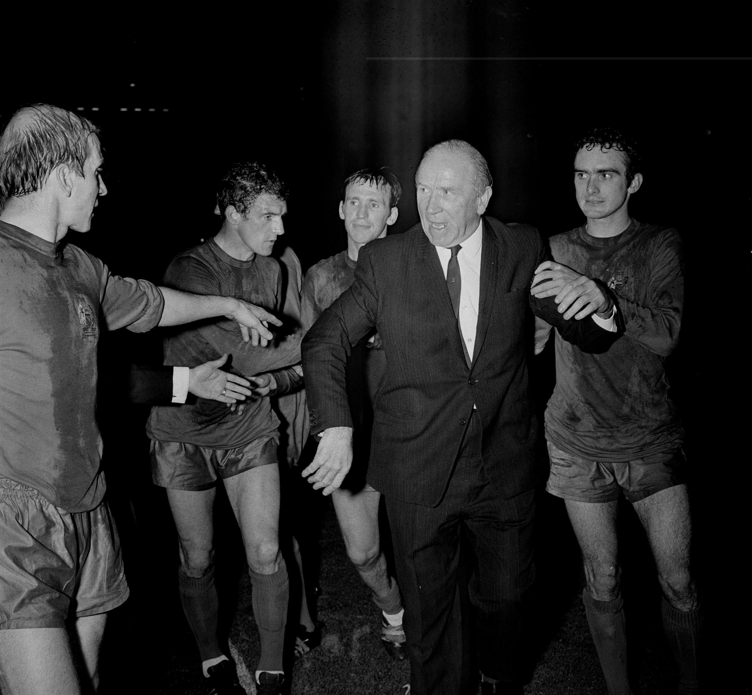 Sir Matt Busby with some of his United team