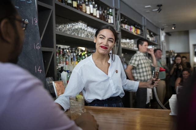 AOC reminds workers to check they were paid extra because of daylight saving (Getty)