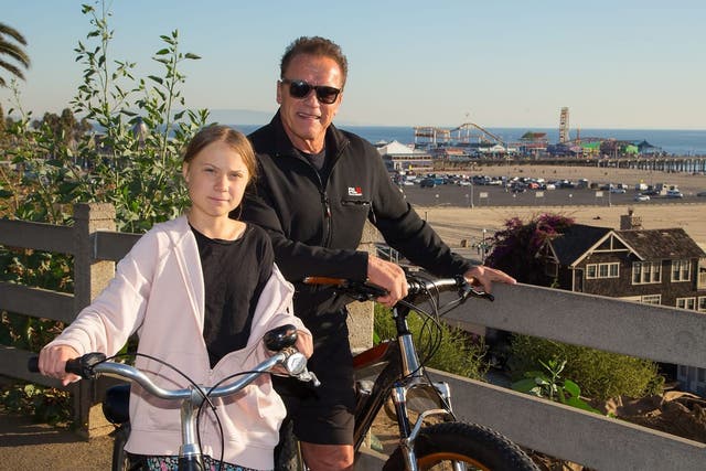 The former California governor shared photographs of himself with Ms Thunberg in California