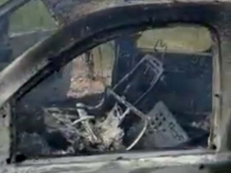 The burnt wreckage of a vehicle a Mormon family was travelling in when at least nine members were killed by gunmen during an ambush in Sonora, Mexico, on 4 November, 2019.
