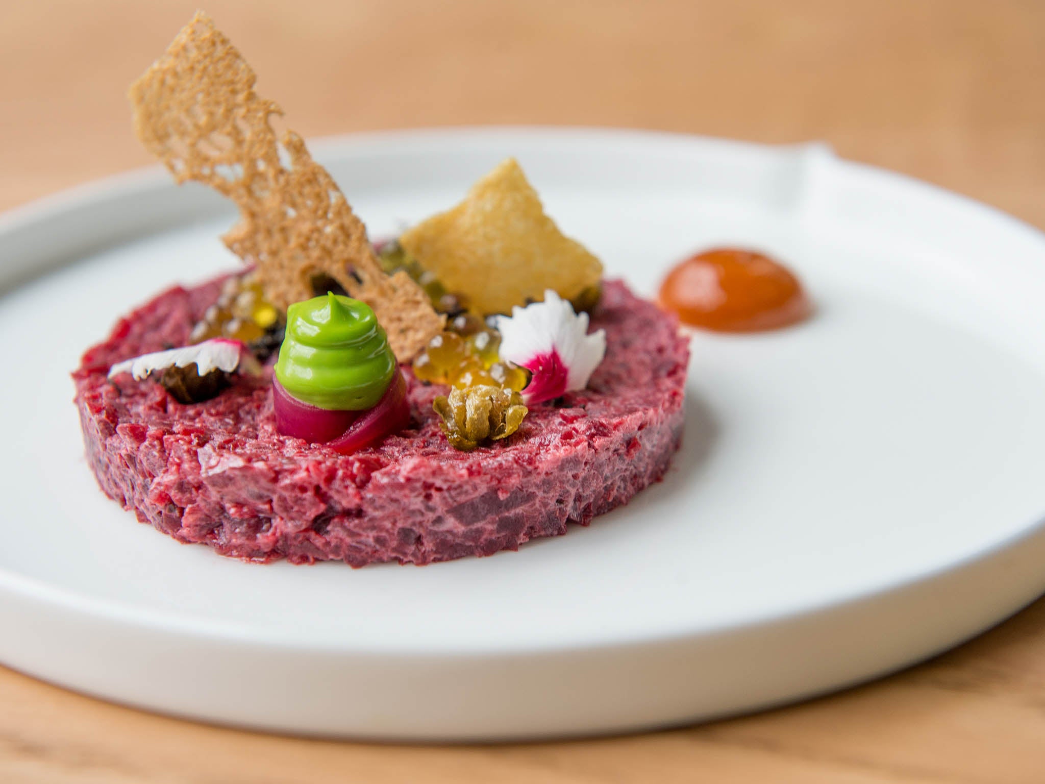 Raw power: beetroot tartare with olive oil caviar